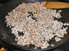 Starting my gypsy sofrito - onions, garlic, and almonds frying