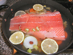 Salmon in court bouillon, ready to poach