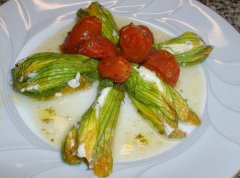 Ricotta stuffed zucchini blossoms with cherry tomato sauce