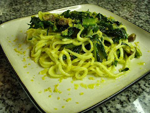 Spaghetti with chicory, pistachios, and bottarga