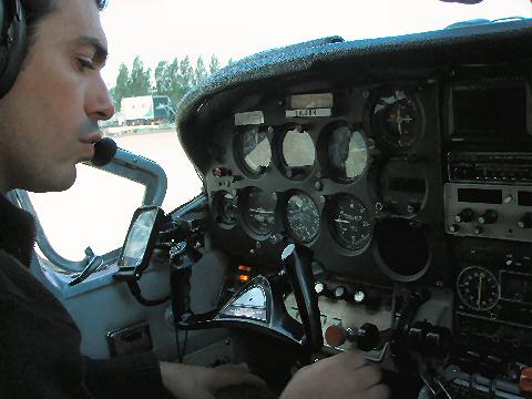 Our pilot, Mario, performs his preflight check