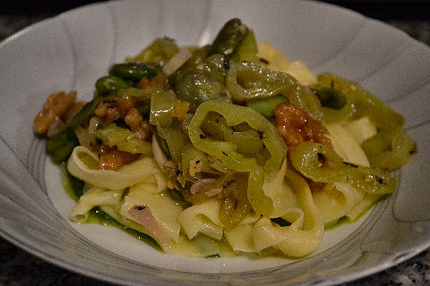 Pappardelle with frying peppers, favas and walnuts