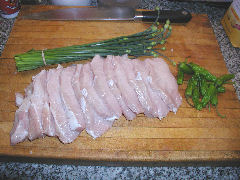 Fresh pork loin, shishito peppers, and garlic chives