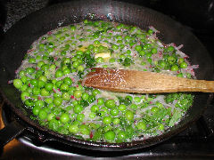 Cook peas, radishes, and herbs in butter