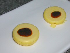Passionfruit blini with coffee caviar
