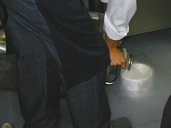 Pouring liquid nitrogen into a container
