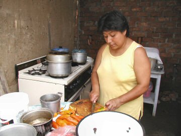 Maria making aji de gallina