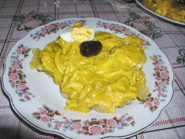 Maria making aji de gallina