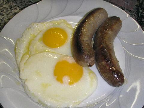 Cooked beef summer sausages and eggs