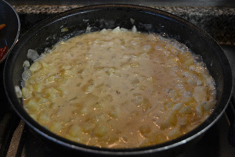 Boga en pieles de panceta, risotto de papa y vegetales