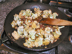 Cauliflower Kuku - sauteeing the ingredients