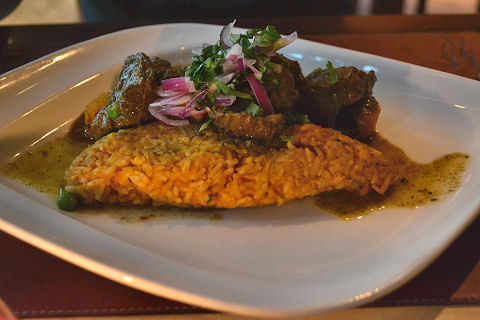 Ceviche - seco de cordero with tacu tacu