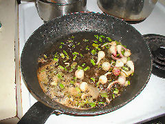 Sauteeing up the green garlic
