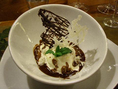 Vanilla ice cream in chocolate Malbec sauce
