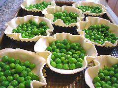 Fresh pea tarts ready to be filled