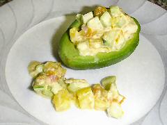 Avocado filled with pineapple salad