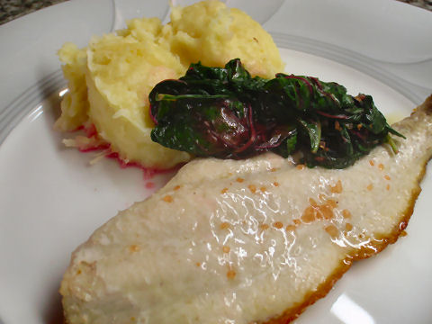 Palometa with Garlic Yuca Mash and Amaranth Greens