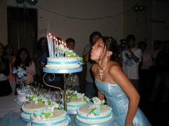 Blowing out the candles on the cake