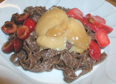 Chocolate fettucini with macerated fruit and dulce de leche