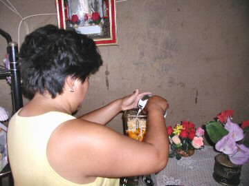 Maria making aji de gallina