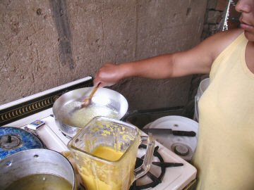 Maria making aji de gallina