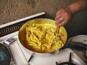 Maria making aji de gallina