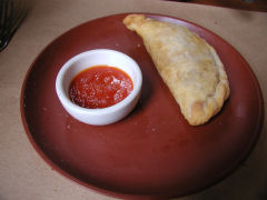 Miranda - empanada with hot sauce