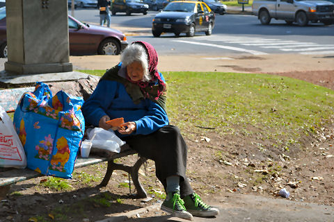 Homeless woman on Plaza Francia