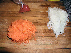 Grate carrots and onion, equal quantities