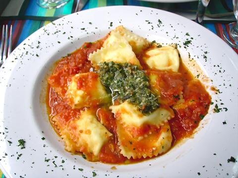 Salgado - raviolis with tuco and pesto