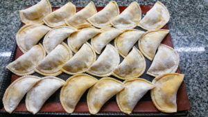 Cheese Ravioli with Peach & Pecan Sofrito 